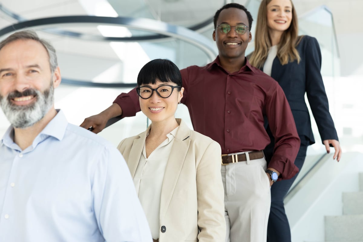 Diverse group of business people standing and smiling