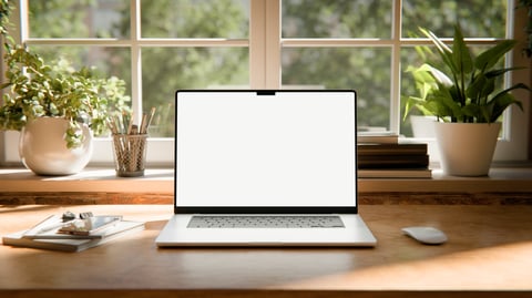laptop screen mockup images captured in a bright industrial loft interior