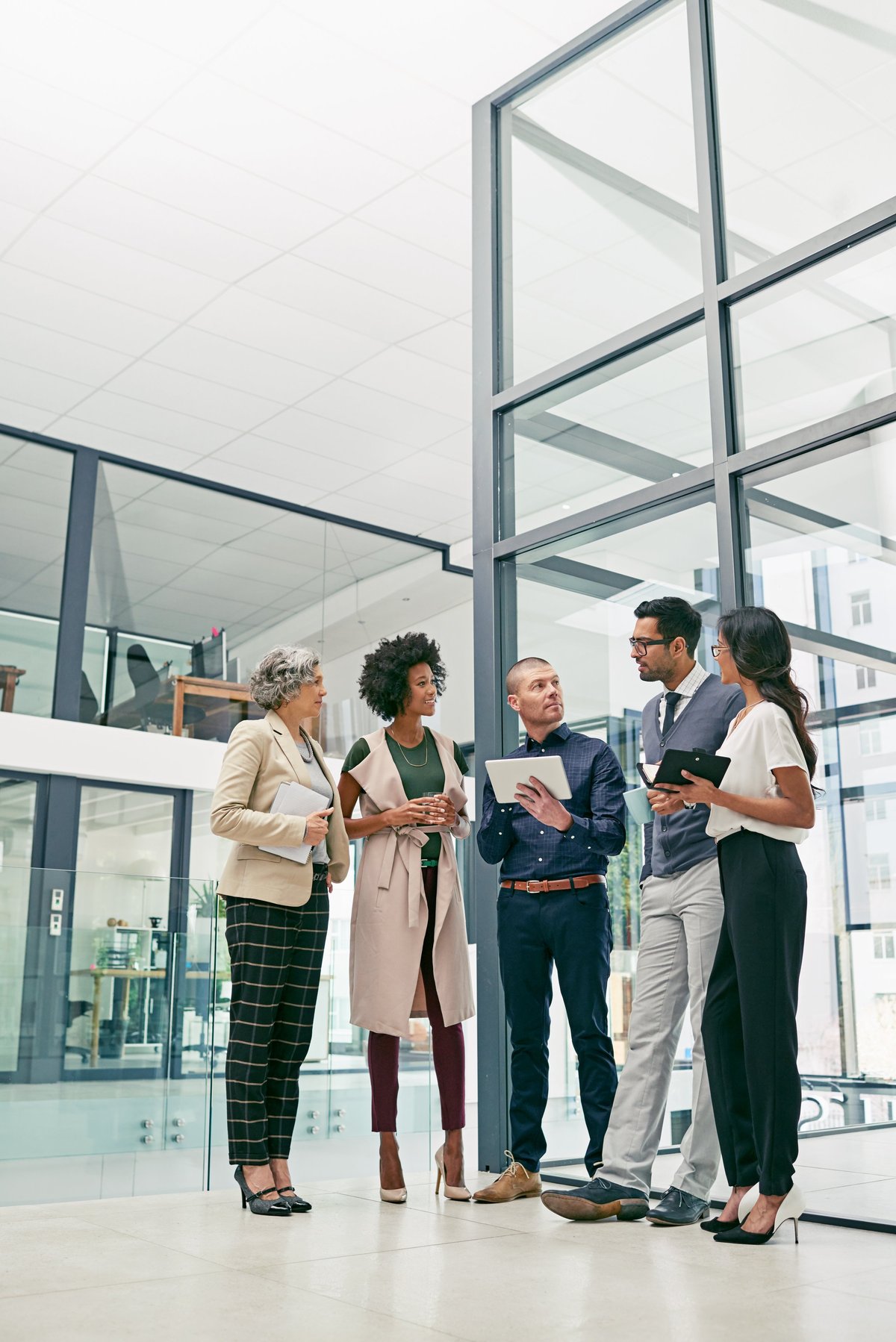 Group of colleagues having an informal meeting in an office